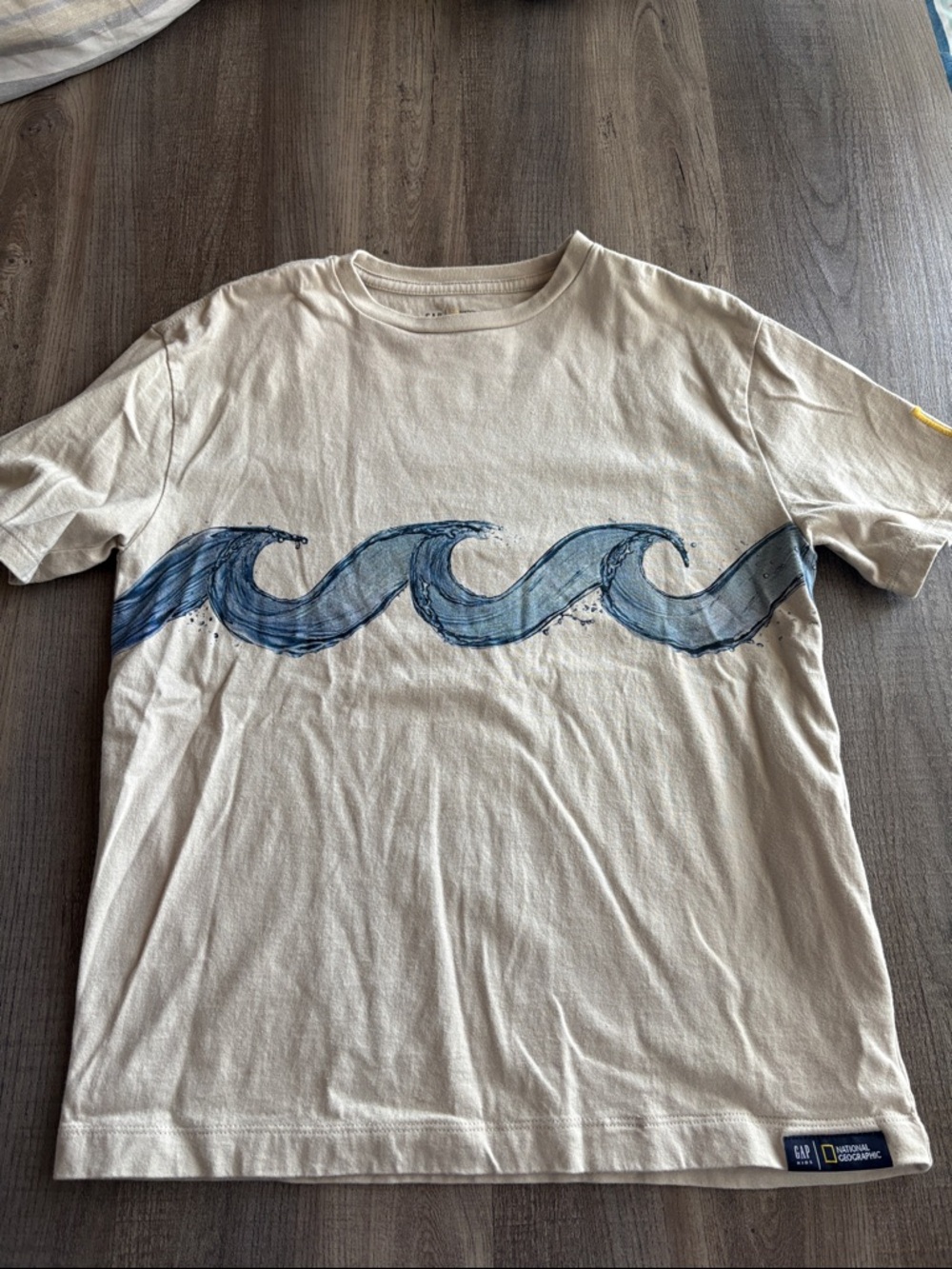 National Geographic Beige Tee with Blue Wave Graphic